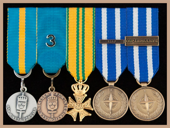 Medaljer monterade sida-vid-sida