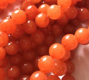 Jade rund 10mm, orange, 1 sträng