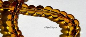 Glaspärlor 6mm, ljusbrun /topaz, 1 strängar