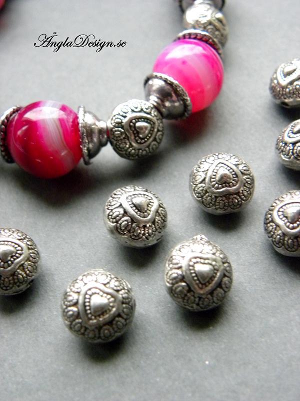 Mellandel, rund 10mm, hjärta antiksilver, 10-pack