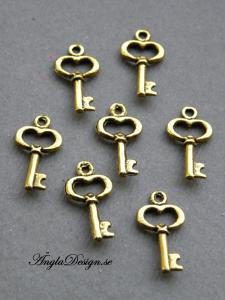 Berlock antikguld, liten nyckel, 10-pack