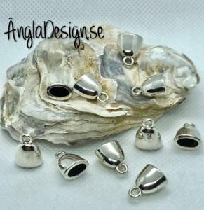 Fästen små bulliga ovala, antiksilver, 10-pack