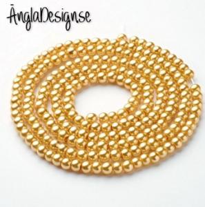 Vaxade glaspärlor 6 mm, beige1 sträng