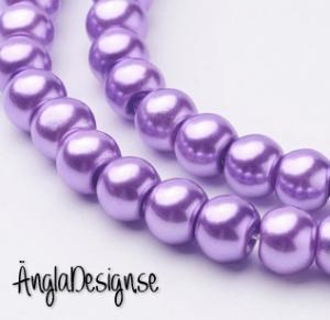 Vaxade glaspärlor 6 mm, lila 1 sträng