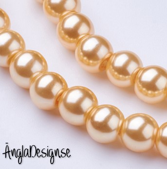 Vaxade glaspärlor 6 mm, ljusorange 1 sträng