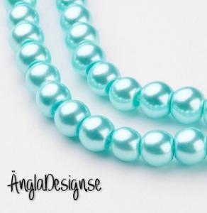 Vaxade glaspärlor 6 mm, ljus turkos 1 sträng