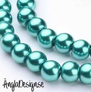 Vaxade glaspärlor 6 mm, mörk turkos 1 sträng