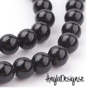 Vaxade glaspärlor 6 mm, svart 1 sträng