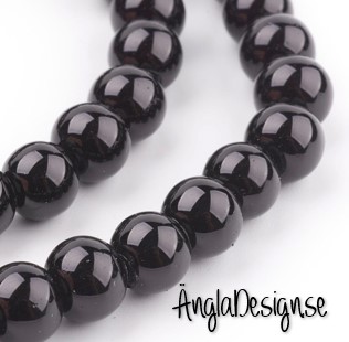 Vaxade glaspärlor 8 mm, svart 1 sträng