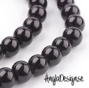 Vaxade glaspärlor 8 mm, svart 1 sträng