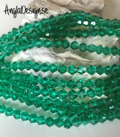 Glaspärla bicone Crystal 4mm mörkgrön, 1 sträng