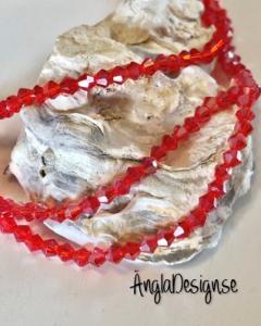 Glaspärla bicone Crystal 4mm röd med AB lyster, 1 sträng