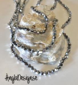 Glaspärla bicone Crystal 4mm silver med elektropläterad lyster, 1 sträng