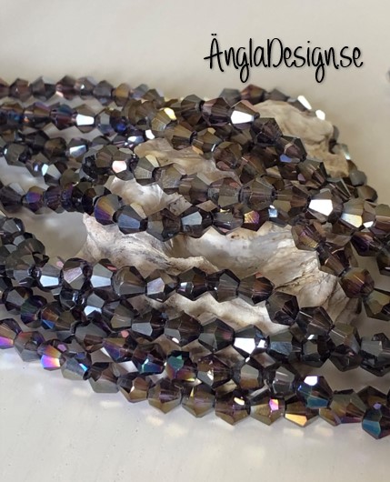 Glaspärla bicone Crystal 6mm flerfärgad med AB lyster, 1 sträng