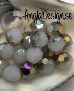 Glaspärla rund facetterad 8mm vitoljiga , 20-pack