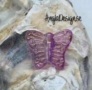 Glaspärla fjäril lila med guld lyster, 1st