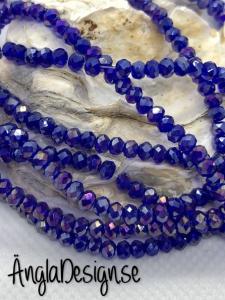 Glasrondell, facetterad 3x2mm blå med AB lyster, 1 sträng