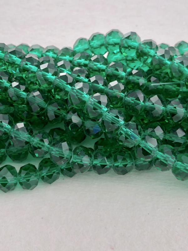 Glasrondell facetterad 8x6mm grön åt emerald, 1 sträng
