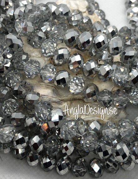 Glasrondell, facetterad 8x6mm silver, 1 sträng