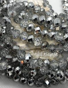 Glasrondell, facetterad 8x6mm silver, 1 sträng