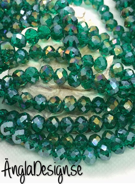Glasrondell, facetterad 8x6mm emerald med AB lyster, 1 sträng
