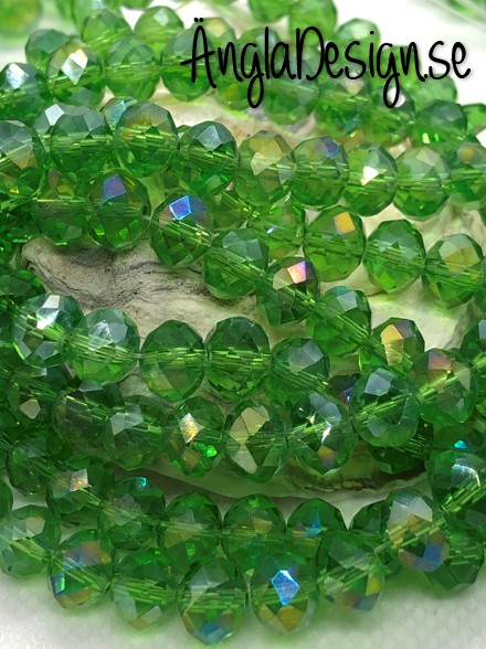 Glasrondell, facetterad 8x6mm grön med AB lyster, 1 sträng