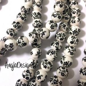 Porslinspärlor 8mm svartblommiga, 10-pack
