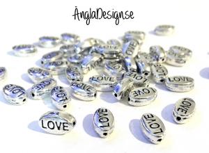 Mellandel antiksilver, "love", 10-pack
