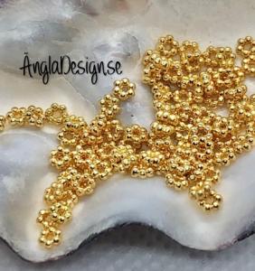 Mellandel mini daisy 3mm guldfärgad, 50-pack