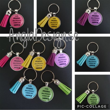FÄRDIG NYCKELRING MED TOFS, ”THINK POSITIVE..”, 1ST