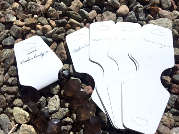 Displaykort "Unikt & handgjort" vit med silvertext, 10-pack