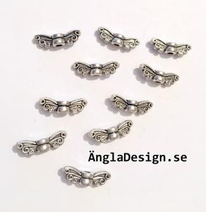 Mellandel antiksilver minivinge älva/ängla, 10-pack