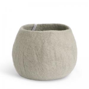 Large rounded flower pot in concrete grey made of wool.