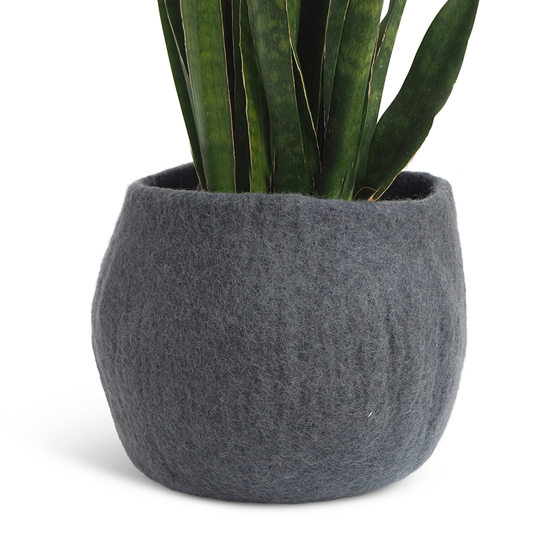 Large rounded flower pot in dark grey made of wool.