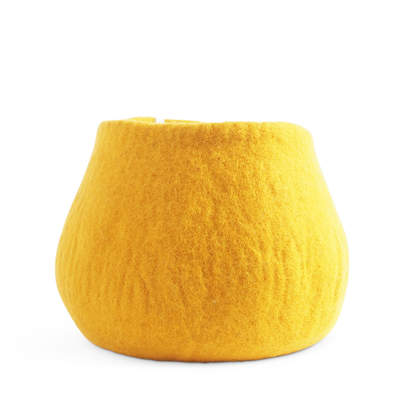 Large rounded flower pot in yellow made of wool.