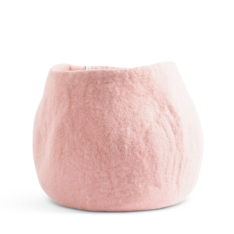 Large rounded flower pot in pink made of wool.