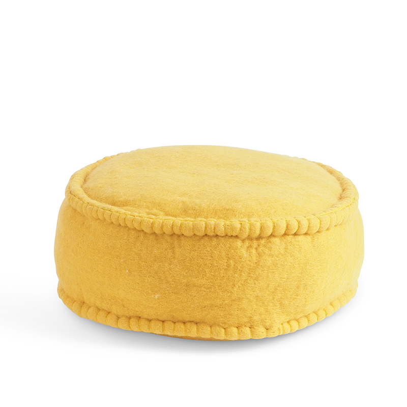 Round Ochre Handmade floor dots in 100% wool  and organic leather tag at Aveva Design. Filled with dinkel. Perfect for meditation.