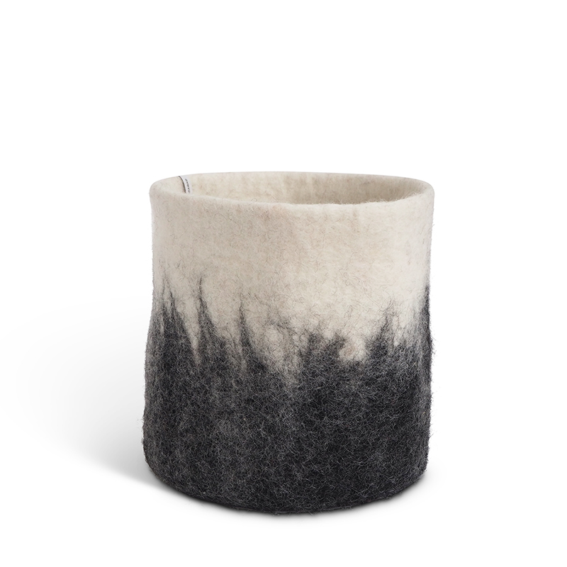Large flower pot in dark grey made of wool with ombre effect.