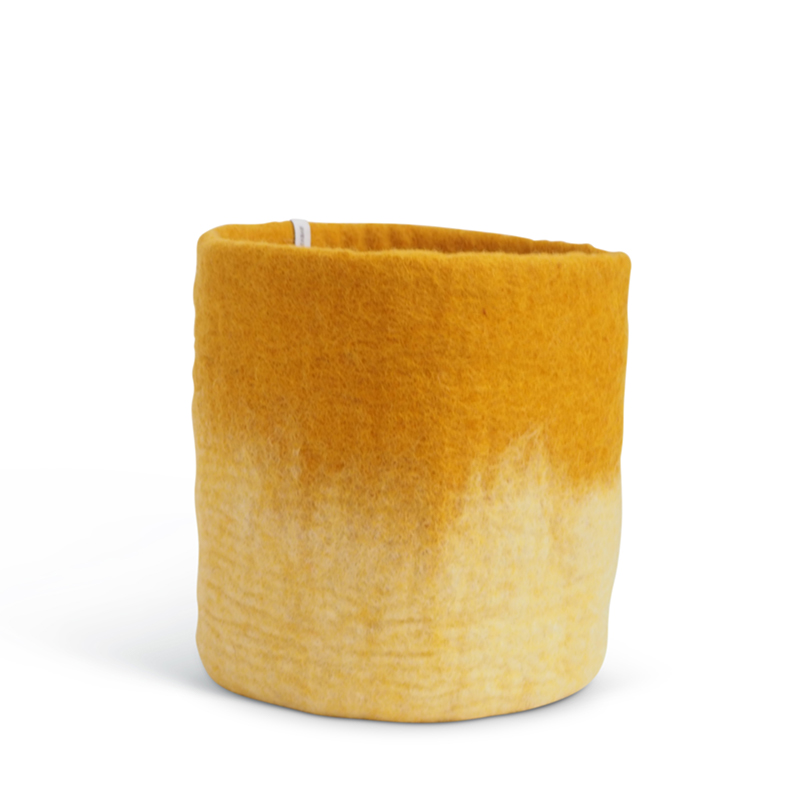 Large flower pot in mustard made of wool with ombre effect.