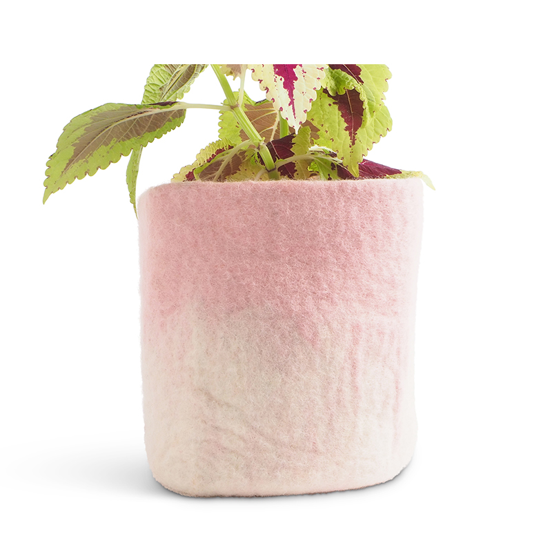 Large flower pot in pink made of wool with ombre effect.