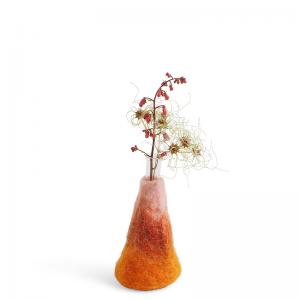 Medium sized orange and pink ombre vase made of wool with a glass for the flowers.