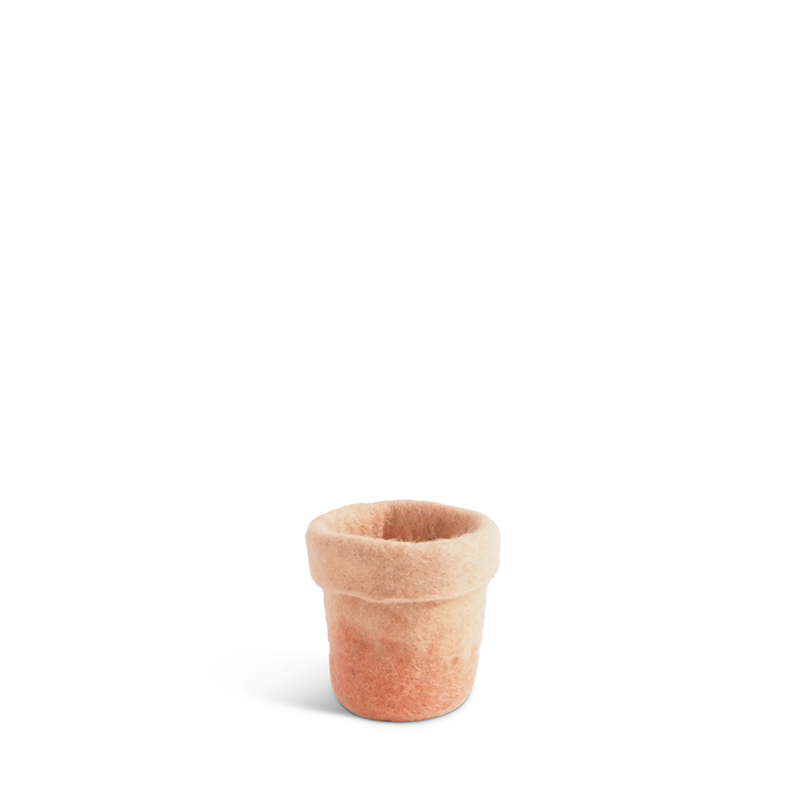Small flower pot made of wool in pink with an ombre effect.