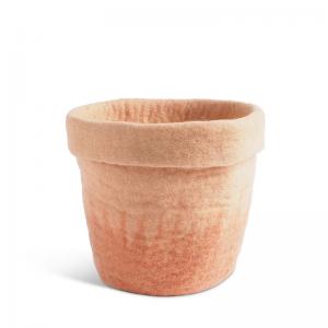 Large flower pot made of wool in pink with an ombre effect.