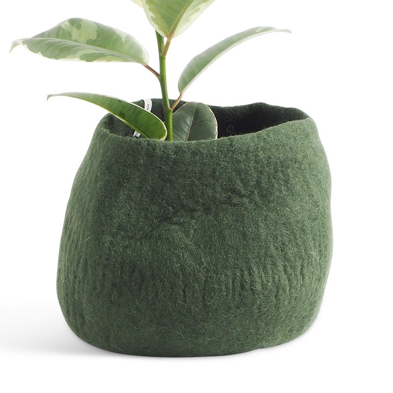 Large rounded flower pot in color moss green, made of wool.
