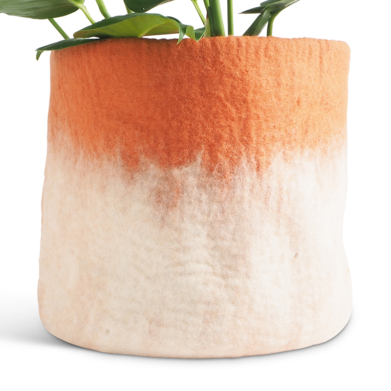 Large flower pot in terracotta made of wool with ombre effect with plant.
