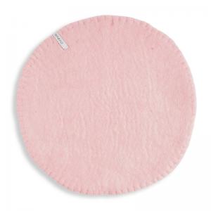 Round pink seat cushions made with naturally dyed wool features the same colour on the top and underside,  and has a beautiful handstitched rim