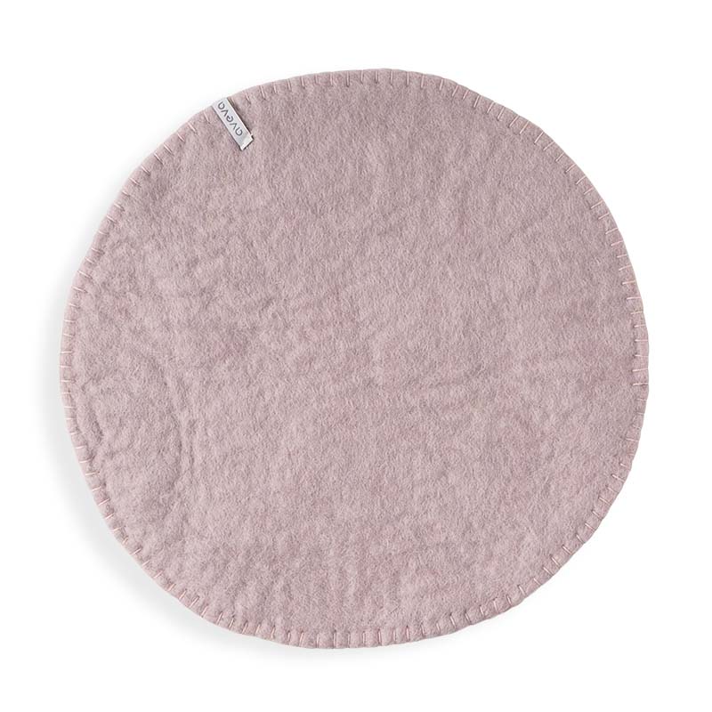 Runda lavender sittdynor gjorda med naturligt färgad ull har samma färg på toppen och undersidan och har en vacker handsydd kant
