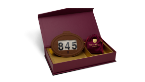 NUMMERLAPP LITEN MÖRKBRUN