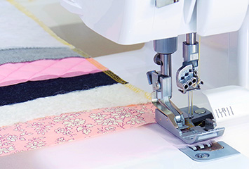 ATD automatisk trådleverans och coversöm på Baby Lock Aspire