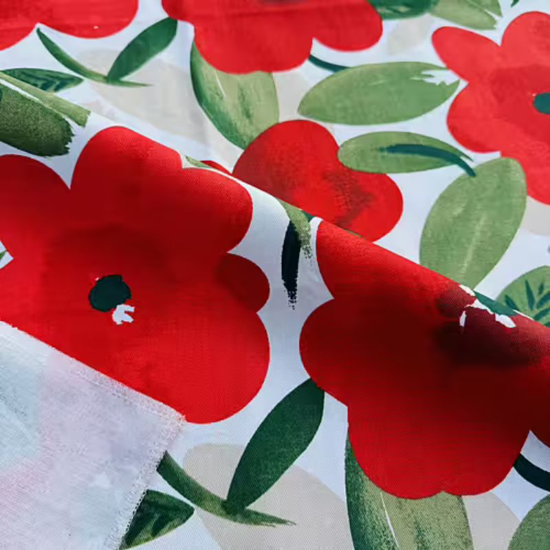 Blommigt bomullstyg – röd/grön